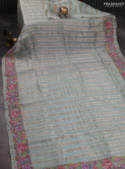 Pure organza silk saree pastel green with allover silver & zari stripes pattern and floral embroidery border