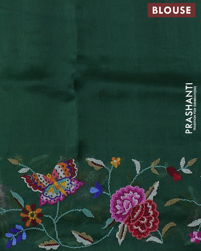 Pure organza silk saree bottle green with allover zari weaves and floral embroidery border