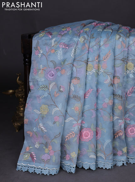 Pure organza silk saree blue shade with floral embroidery work and lace work border