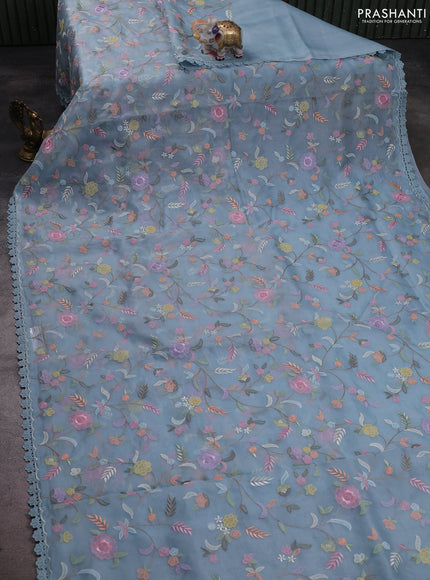 Pure organza silk saree blue shade with floral embroidery work and lace work border