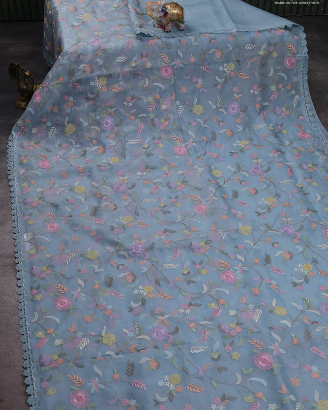 Pure organza silk saree blue shade with floral embroidery work and lace work border