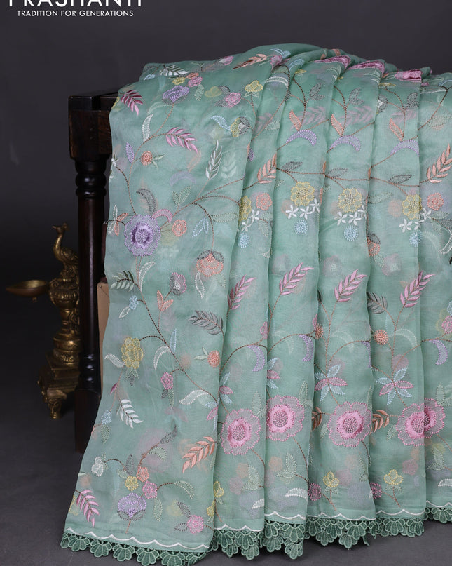 Pure organza silk saree pastel green with floral embroidery work and lace work border