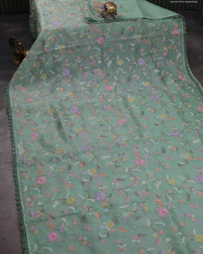 Pure organza silk saree pastel green with floral embroidery work and lace work border
