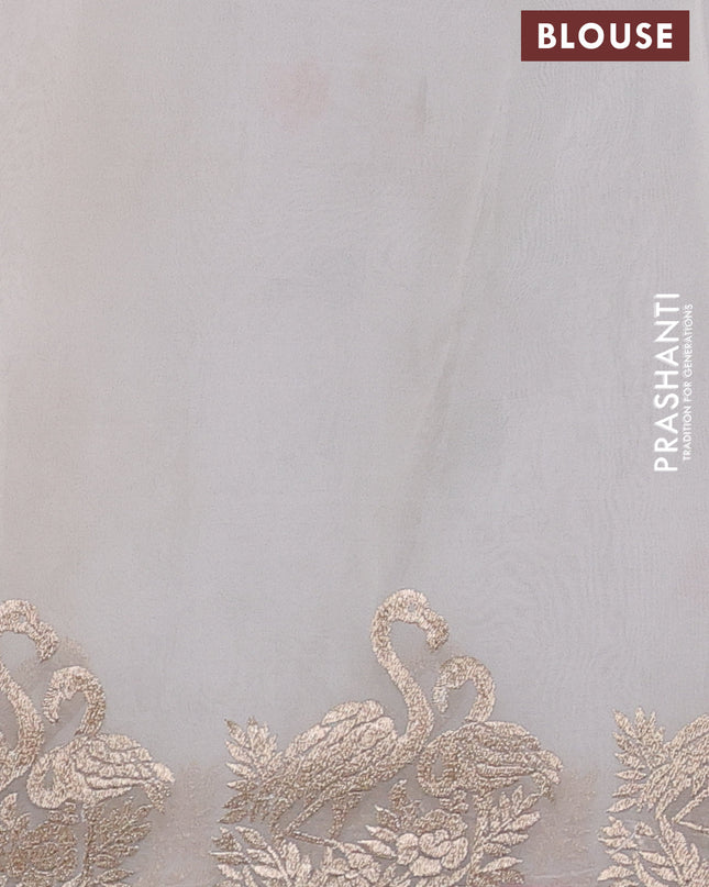 Pure organza silk saree off white and red with allover embroidery work and embroidery butta border
