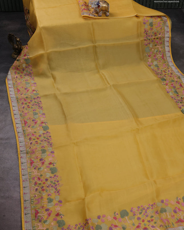 Pure organza silk saree yellow with plain body and embroidery work border