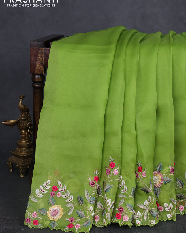Pure organza silk saree parrot green with plain body and floral embroidery border
