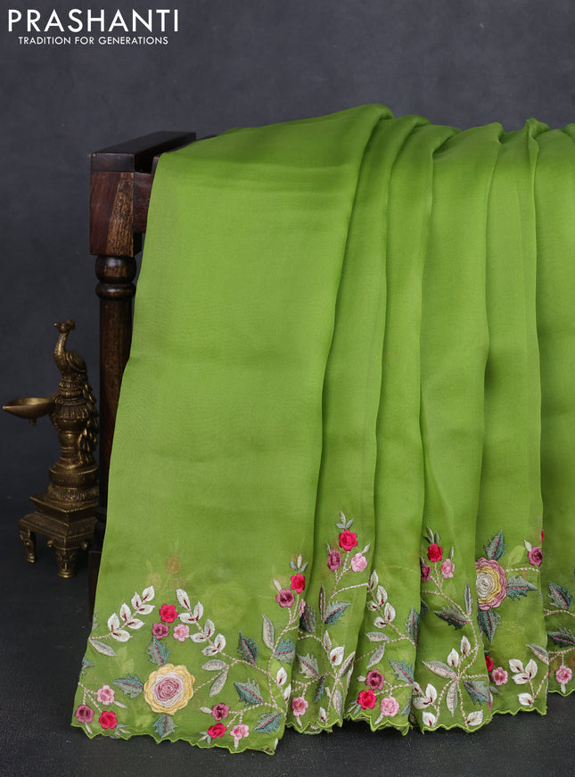 Pure organza silk saree parrot green with plain body and floral embroidery border