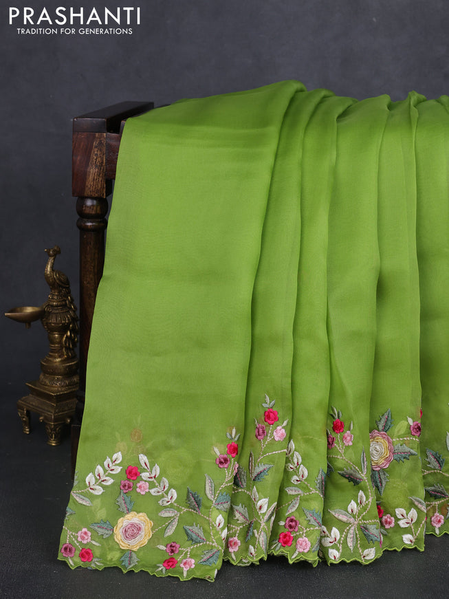 Pure organza silk saree parrot green with plain body and floral embroidery border