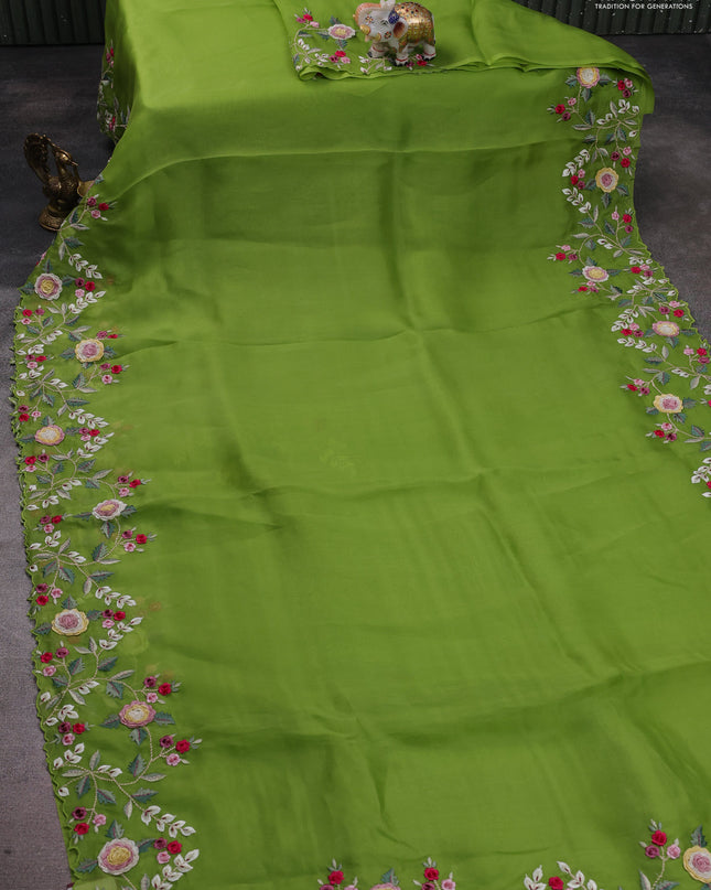 Pure organza silk saree parrot green with plain body and floral embroidery border