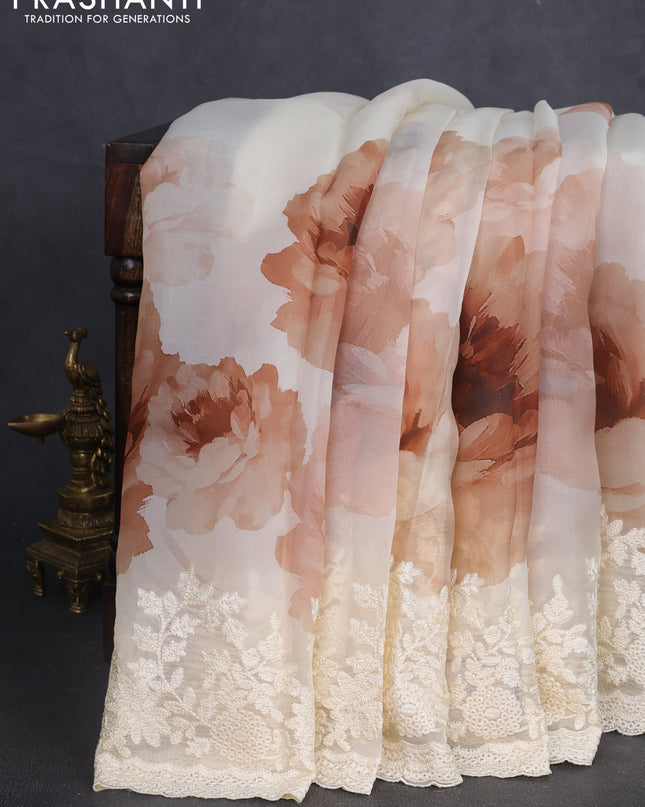 Pure organza silk saree cream with floral prints and floral embroidery border
