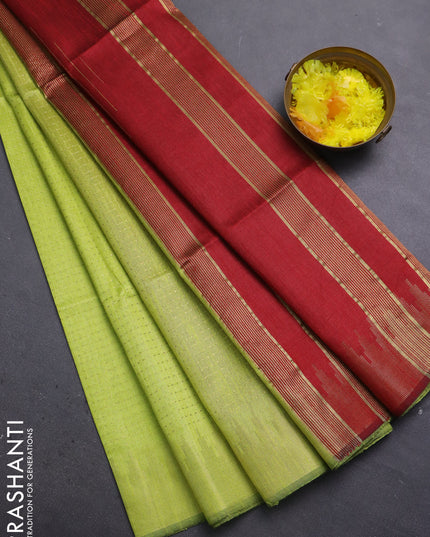 Semi dupion saree fluorescent green and maroon with allover zari weaves and temple zari woven border