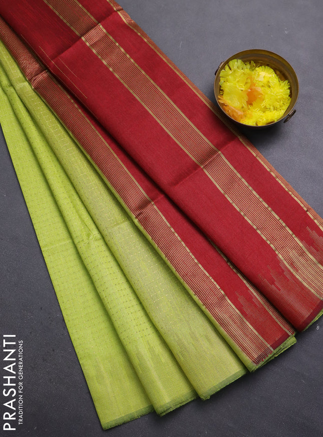 Semi dupion saree fluorescent green and maroon with allover zari weaves and temple zari woven border