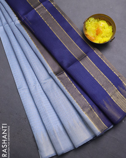 Semi dupion saree pastel blue and navy blue with allover zari weaves and temple zari woven border