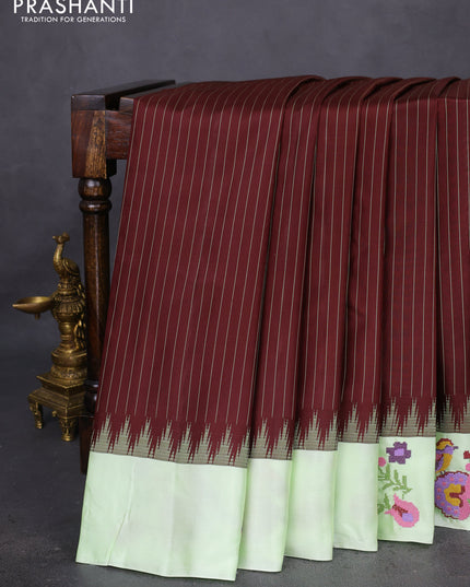 Pure gadwal silk saree deep maroon and pista green with allover stripes pattern and embroided butta border