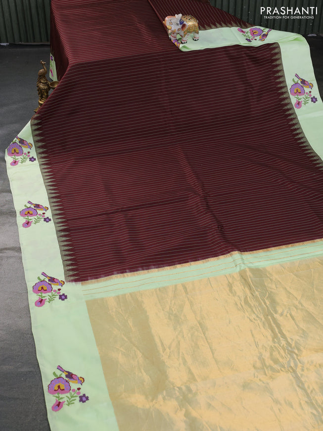 Pure gadwal silk saree deep maroon and pista green with allover stripes pattern and embroided butta border