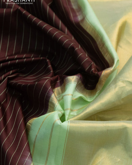 Pure gadwal silk saree deep maroon and pista green with allover stripes pattern and embroided butta border
