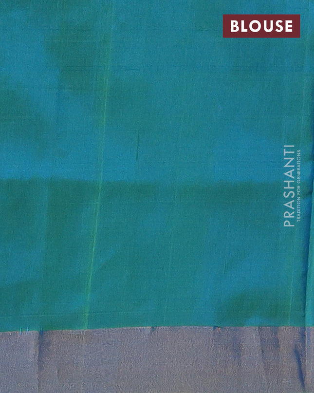 Pure uppada silk saree cs blue and dual shade of teal green with silver zari woven floral buttas and zari woven butta border