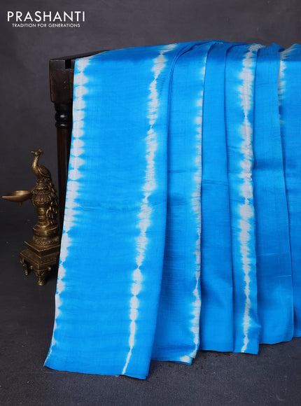 Printed silk saree cs blue and orange with shibori prints and kalamkari hand painted pallu & blouse