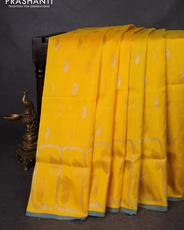 Pure uppada silk saree yellow and cs blue with silver & gold zari woven buttas and rich zari border