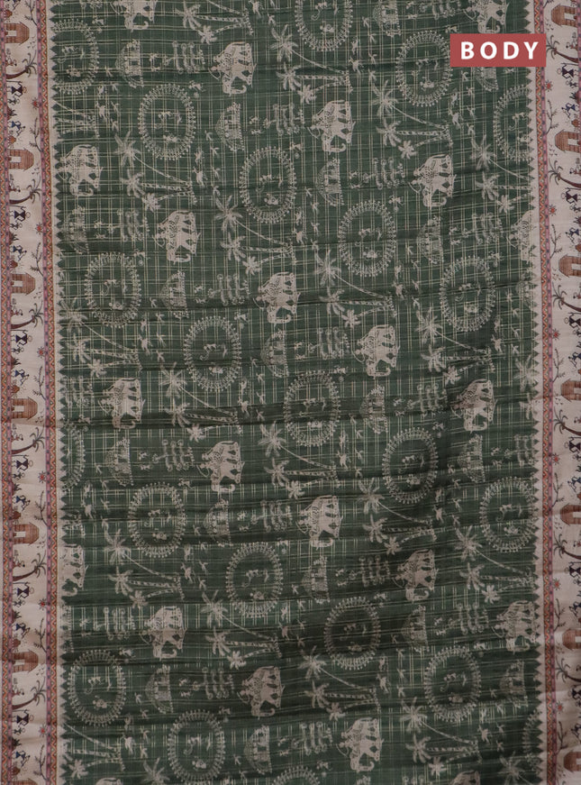 Semi tussar saree sap green and cream with allover zari checks & warli prints  and printed border