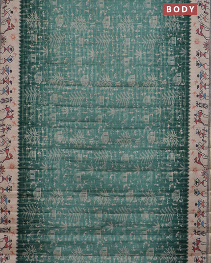 Semi tussar saree teal green and cream with allover zari checks & warli prints  and printed border