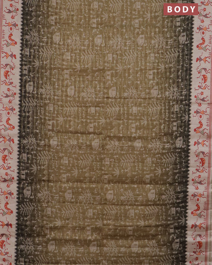 Semi tussar saree dark mehendi green and cream with allover zari checks & warli prints  and printed border