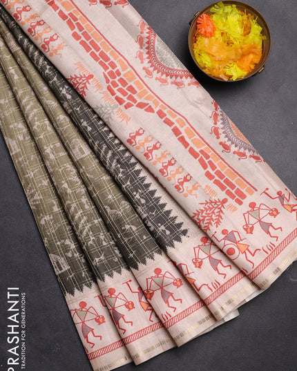 Semi tussar saree sap green and cream with allover zari checks & warli prints  and printed border