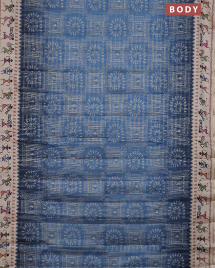 Semi tussar saree blue and cream with allover zari checks & warli prints  and printed border