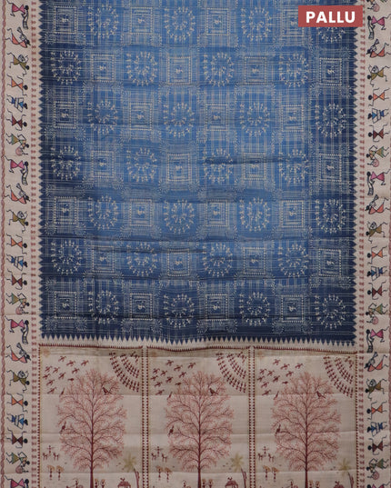 Semi tussar saree blue and cream with allover zari checks & warli prints  and printed border