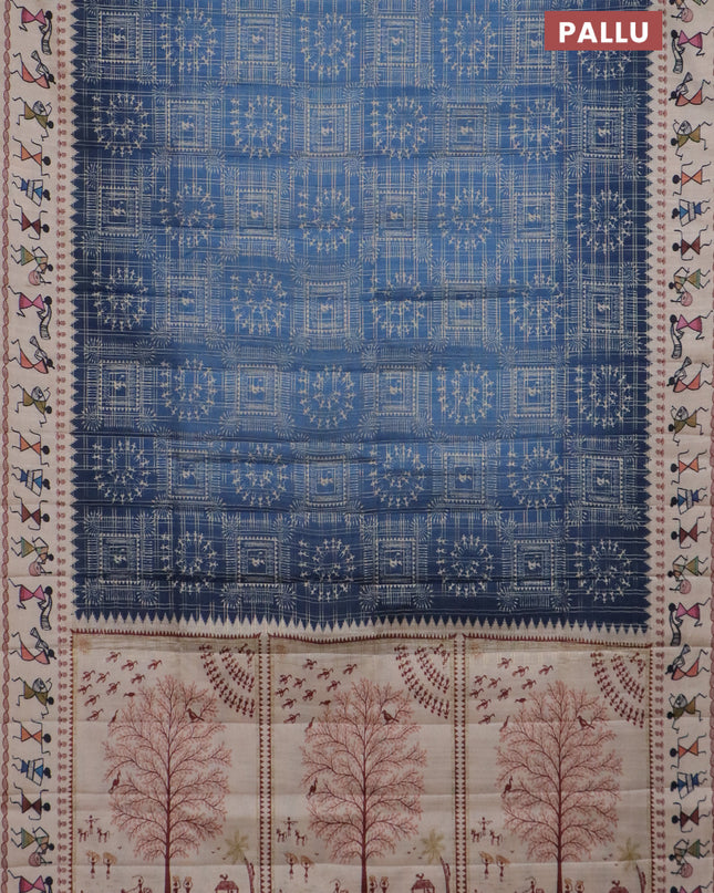 Semi tussar saree blue and cream with allover zari checks & warli prints  and printed border