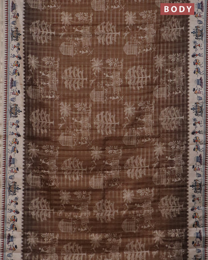 Semi tussar saree brown and cream with allover zari checks & warli prints  and printed border