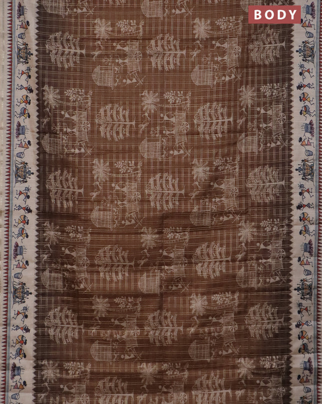 Semi tussar saree brown and cream with allover zari checks & warli prints  and printed border