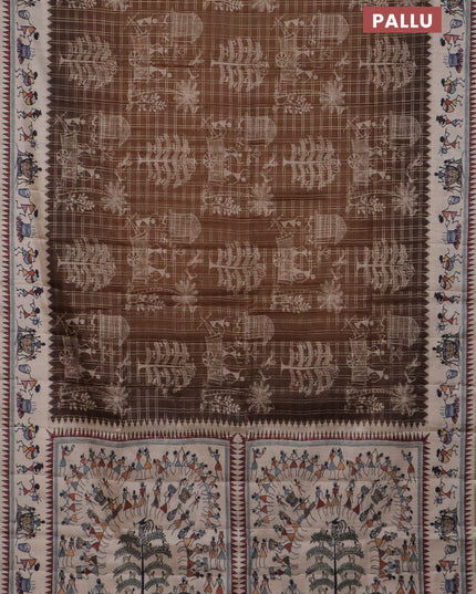 Semi tussar saree brown and cream with allover zari checks & warli prints  and printed border