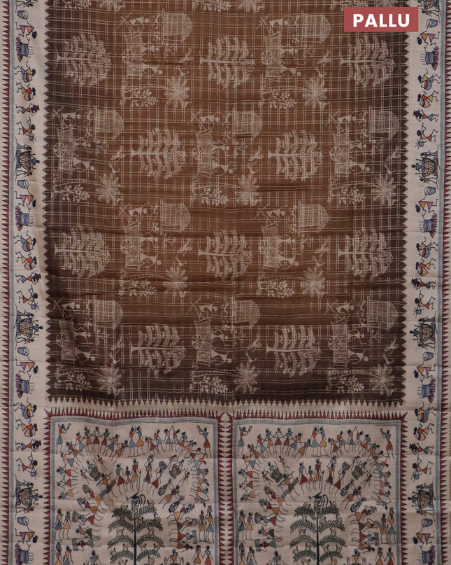 Semi tussar saree brown and cream with allover zari checks & warli prints  and printed border
