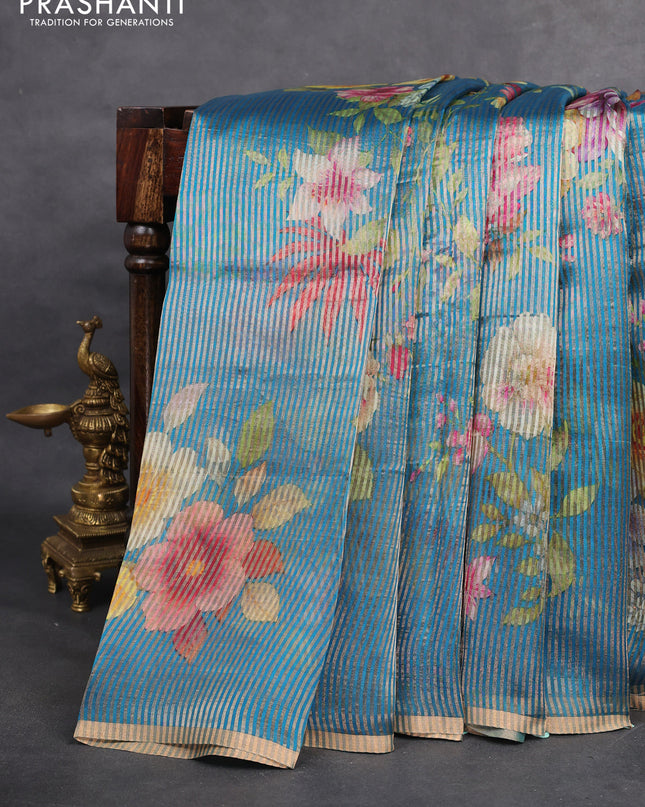 Pure organza silk saree cs blue with floral digital prints & zari stripe pattern and zari woven piping border