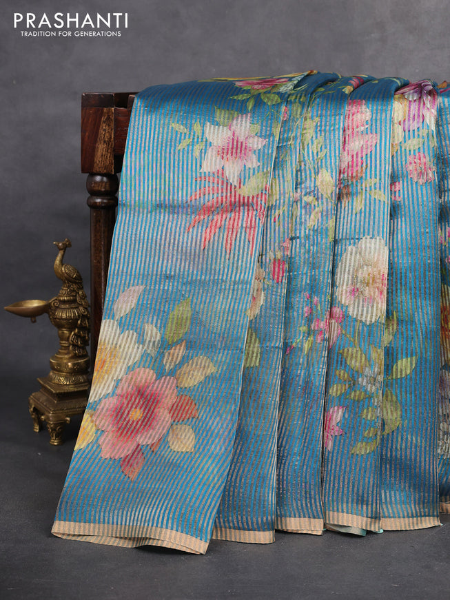 Pure organza silk saree cs blue with floral digital prints & zari stripe pattern and zari woven piping border