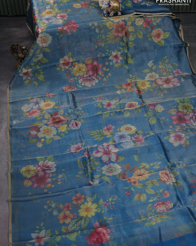 Pure organza silk saree cs blue with floral digital prints & zari stripe pattern and zari woven piping border