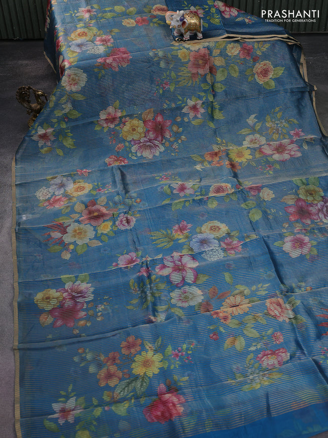 Pure organza silk saree cs blue with floral digital prints & zari stripe pattern and zari woven piping border