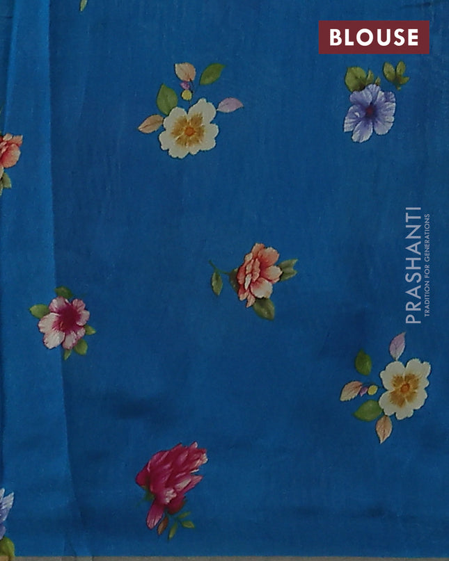 Pure organza silk saree cs blue with floral digital prints & zari stripe pattern and zari woven piping border