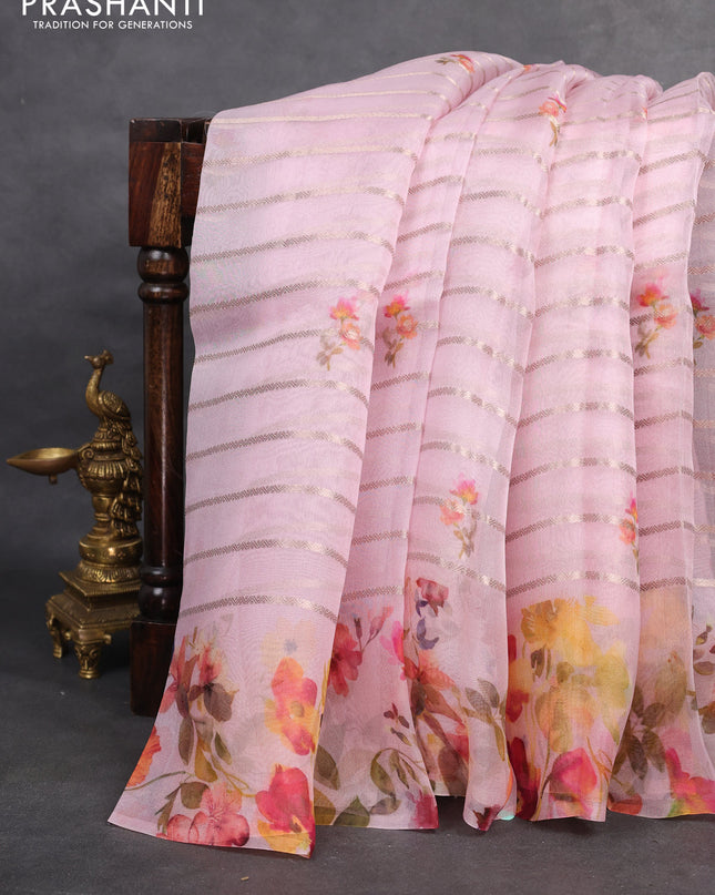 Pure organza silk saree baby pink with allover zari strip & floral digital prints and floral digital printed border