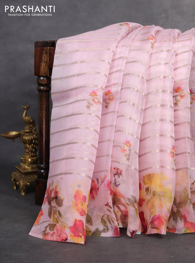 Pure organza silk saree baby pink with allover zari strip & floral digital prints and floral digital printed border