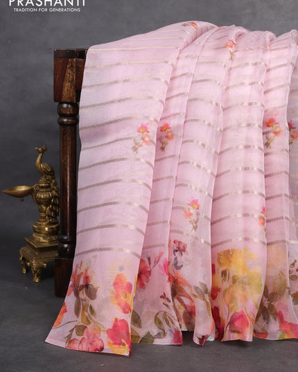 Pure organza silk saree baby pink with allover zari strip & floral digital prints and floral digital printed border