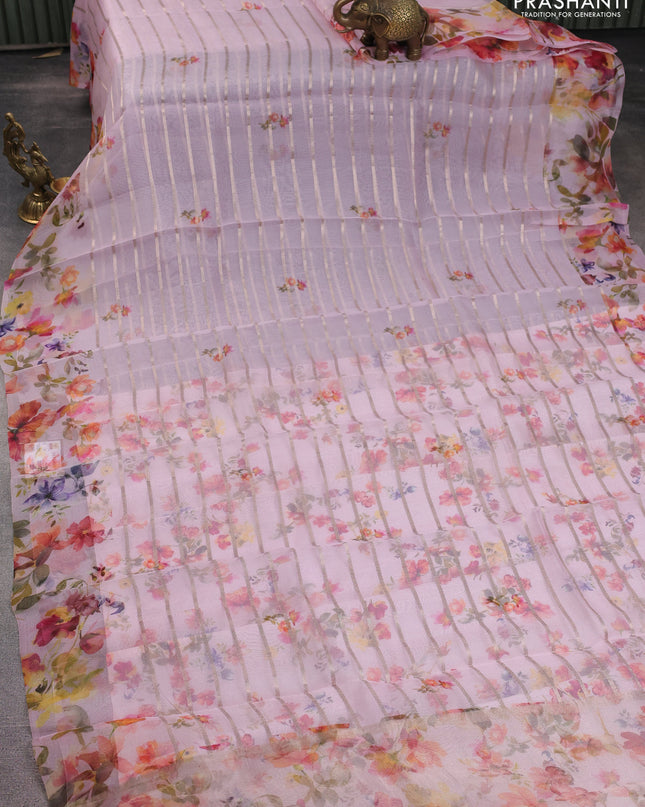 Pure organza silk saree baby pink with allover zari strip & floral digital prints and floral digital printed border