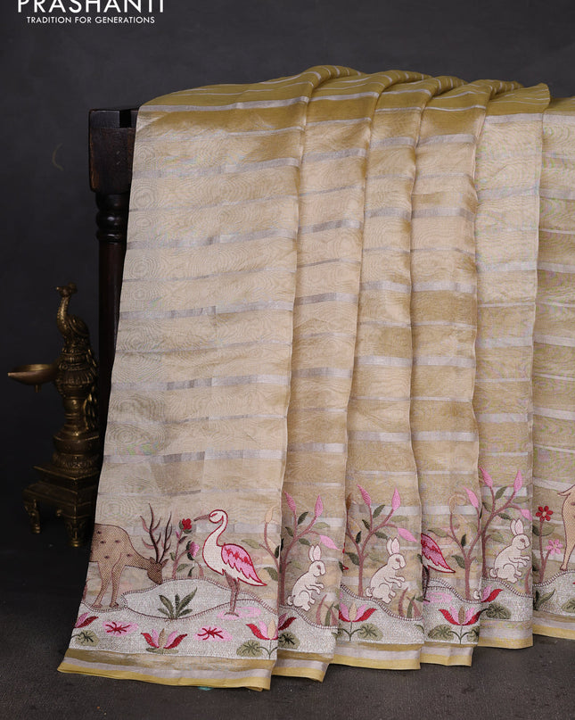 Pure tissue silk saree pale yellow with allover silver zari strip pattern & beaded work and embroidery border