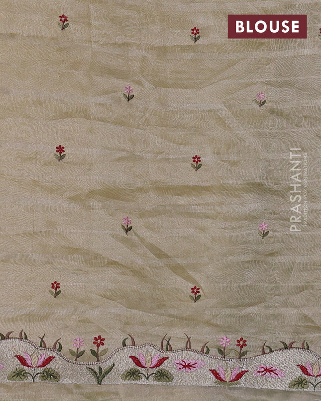 Pure tissue silk saree pale yellow with allover silver zari strip pattern & beaded work and embroidery border