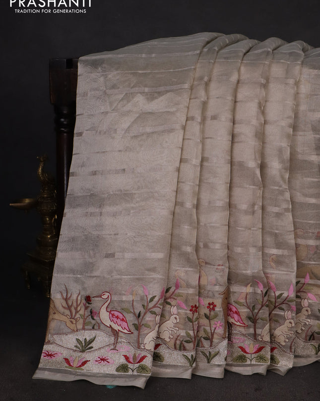 Pure tissue silk saree pastel grey with allover silver zari strip pattern & beaded work and embroidery border