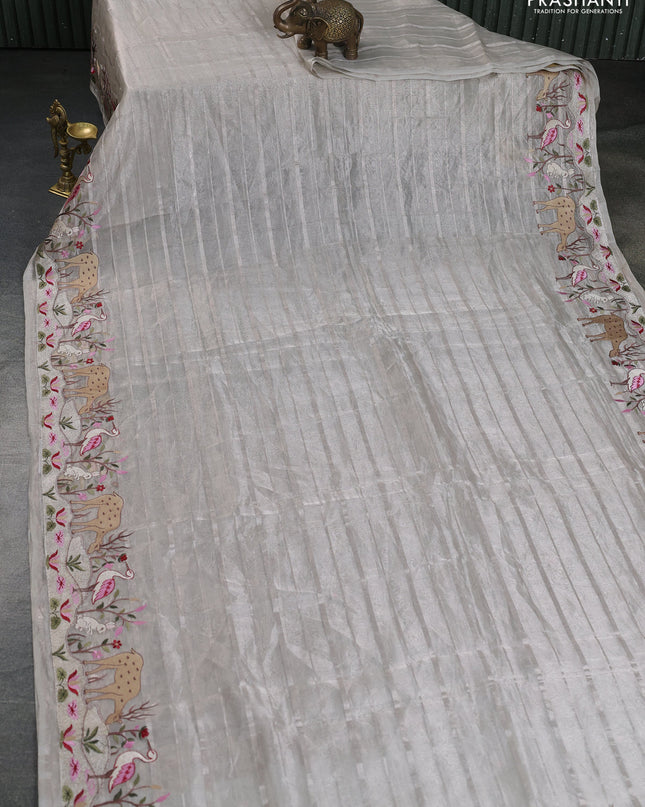 Pure tissue silk saree pastel grey with allover silver zari strip pattern & beaded work and embroidery border