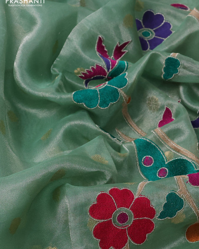 Pure tissue silk saree teal green shade with allover zari woven buttas and zari woven border