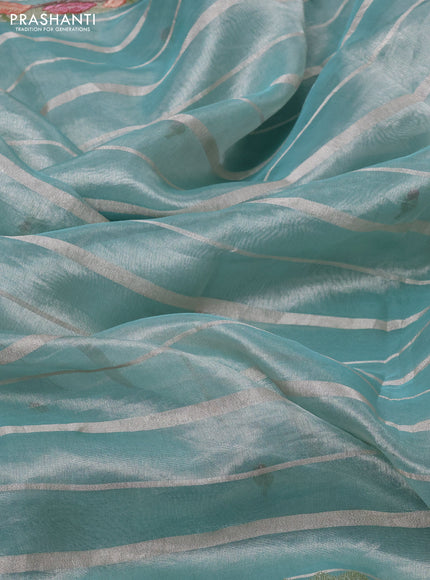 Pure tissue silk saree teal blue with allover silver zari strip pattern & beaded work and pichwai embroidery border