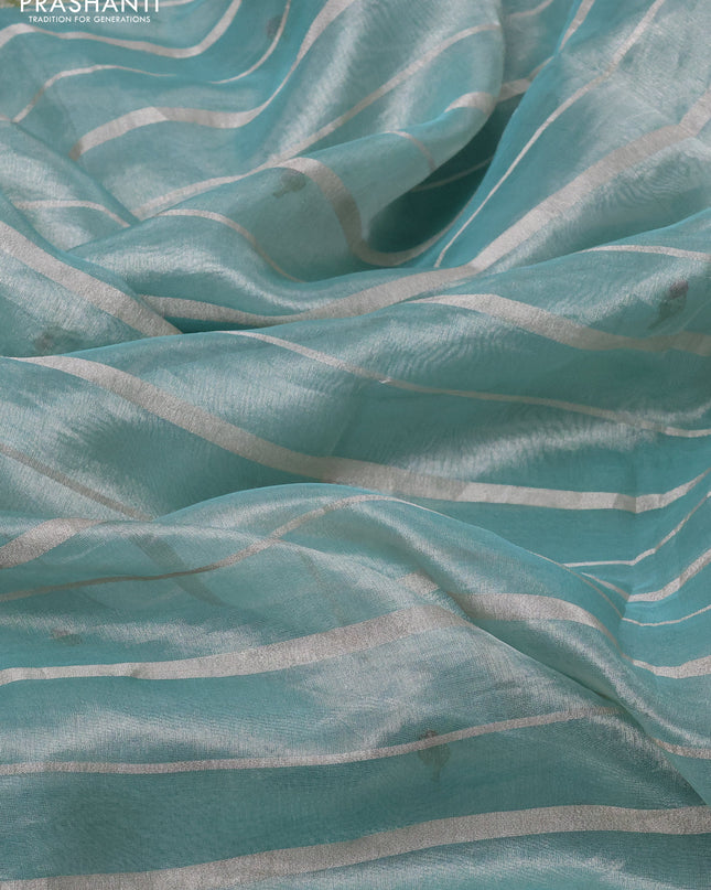 Pure tissue silk saree teal blue with allover silver zari strip pattern & beaded work and pichwai embroidery border